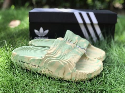 Update Your Shoe Game with the Fashion-Forward Magic Lime and Desert Sand Adidas adilette 22 slides